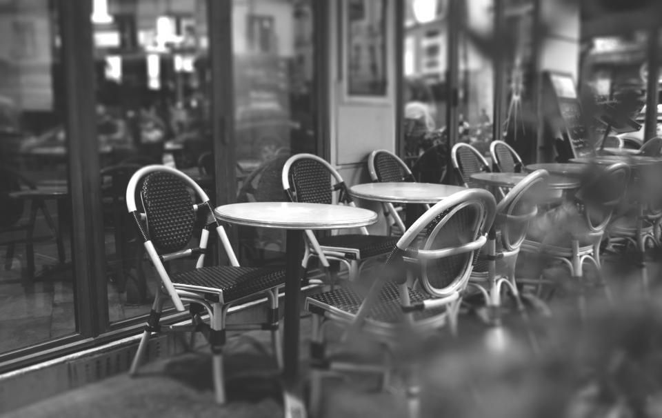 The cafe counter with stools alongside
