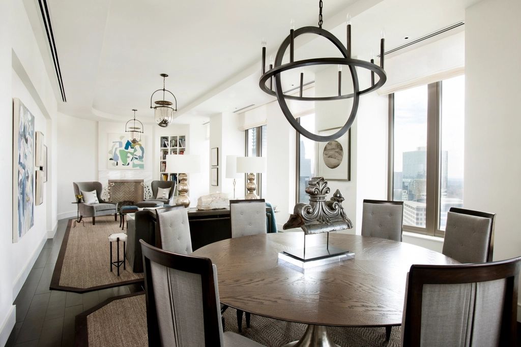 A suite sitting room with a sofa and armchairs
